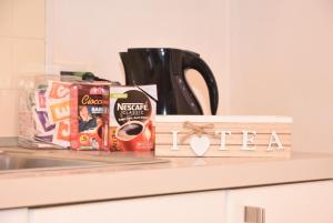 Coffee and tea making facilities at PudApartment Holiday Home