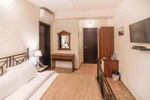 Letto o letti in una camera di Le Caucase