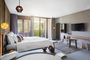Posteľ alebo postele v izbe v ubytovaní Hotel Löwenhof