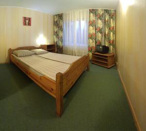 Кровать или кровати в номере Motel Brencis