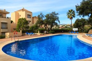 Swimmingpoolen hos eller tæt på Hacienda Elviria