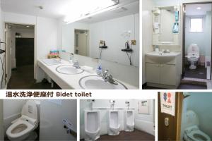 a bathroom with a sink, toilet, and mirror at Hotel Raizan South in Osaka