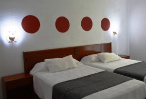 Postel nebo postele na pokoji v ubytování Hotel Venta de la Punta