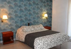 Postel nebo postele na pokoji v ubytování Hotel Venta de la Punta
