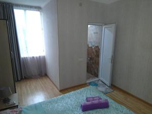 Postel nebo postele na pokoji v ubytování Irina