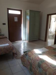 Postel nebo postele na pokoji v ubytování Agriturismo La Selva