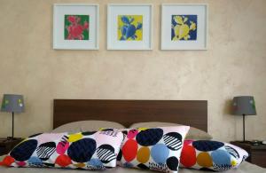 A bed or beds in a room at Appartamento Il Mandorlo - Custonaci