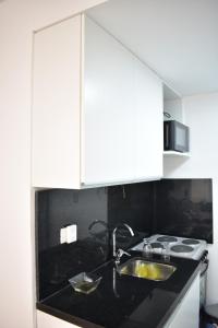 Köök või kööginurk majutusasutuses Loft para 4 personas 2º B