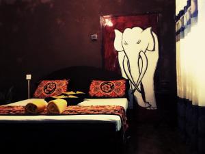 Кровать или кровати в номере Ancient Gardens - Villa