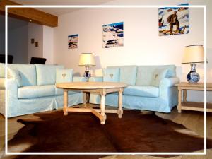 Posezení v ubytování Chalet Der Tyroler Adler im Zentrum vom Wilden Kaiser
