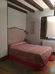 Postel nebo postele na pokoji v ubytování Posada Real Torre Berrueza