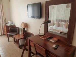 TV a/nebo společenská místnost v ubytování The Vic Hotel