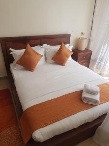 Postel nebo postele na pokoji v ubytování The Vic Hotel