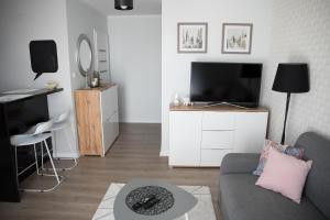 TV a/nebo společenská místnost v ubytování Apartament Soft 11