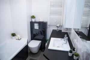 Koupelna v ubytování Apartament Soft 11 + 26 fotografií