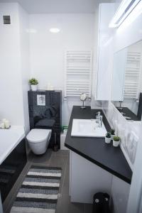 Koupelna v ubytování Apartament Soft 11