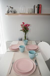 Příslušenství pro přípravu čaje a kávy v ubytování Apartament Soft 11