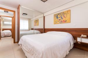 Postel nebo postele na pokoji v ubytování Aquaria Natal Hotel