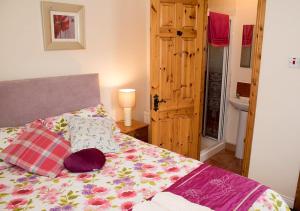 Postel nebo postele na pokoji v ubytování Sive Budget Accommodation