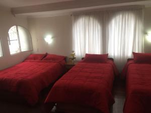 Postel nebo postele na pokoji v ubytování Hotel Plaza del Teatro