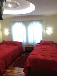 Postel nebo postele na pokoji v ubytování Hotel Plaza del Teatro