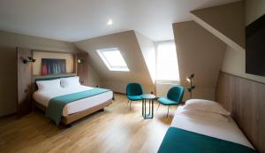 Voodi või voodid majutusasutuse HANNONG Hotel & Wine Bar toas
