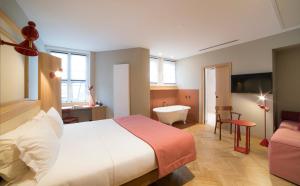 Voodi või voodid majutusasutuse HANNONG Hotel & Wine Bar toas