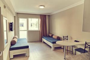 Postel nebo postele na pokoji v ubytování Two Seas Hotel