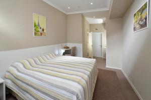 Postel nebo postele na pokoji v ubytování light hotel & hub