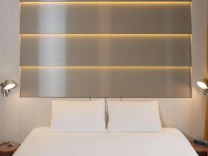 Voodi või voodid majutusasutuse Ibis Styles Nivelles toas
