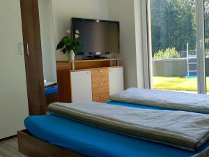 Postel nebo postele na pokoji v ubytování Ferienwohnung Colleen