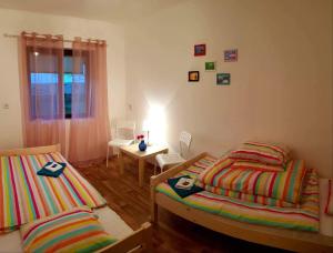 Кровать или кровати в номере Chata Domaša - Monika