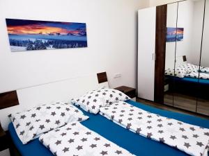 Voodi või voodid majutusasutuse Ferienwohnung Colleen toas