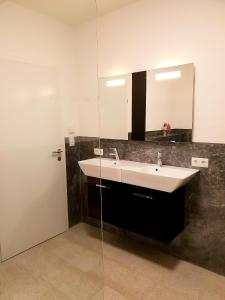 Koupelna v ubytování Ferienwohnung Colleen + 30 fotografií