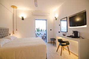 Llit o llits en una habitació de Lofos Village