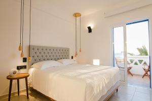 Llit o llits en una habitació de Lofos Village