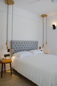 Llit o llits en una habitació de Lofos Village