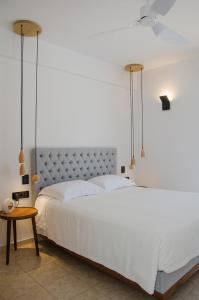 Llit o llits en una habitació de Lofos Village