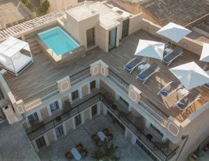 Bazén v ubytovaní Boutique Hotel Petit Sant Miquel alebo v jeho blízkosti
