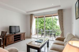 TV a/nebo společenská místnost v ubytování Jomtien Beach Penthouses