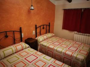 Postel nebo postele na pokoji v ubytování Cortijo Los Soledad