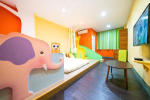 台南的住宿－築樂窩 ，儿童间 - 带大象主题卧室