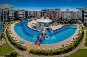 an overhead view of a swimming pool in a city at Onkel Rada Apart Hotel in Antalya