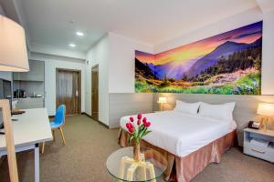 Postel nebo postele na pokoji v ubytování Hotel Bridges Bishkek