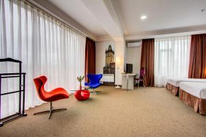 Postel nebo postele na pokoji v ubytování Hotel Bridges Bishkek