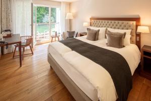 Letto o letti in una camera di Waldhotel Stuttgart