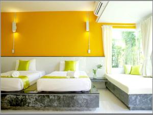 Cama o camas de una habitación en Aonang Paradise Resort Krabi