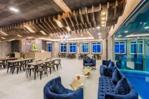 Posezení v ubytování Evergreen Suite Hotel