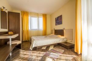 Postel nebo postele na pokoji v ubytování Coral Guest House