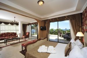 TV a/nebo společenská místnost v ubytování Villa Augusto Boutique Hotel & SPA